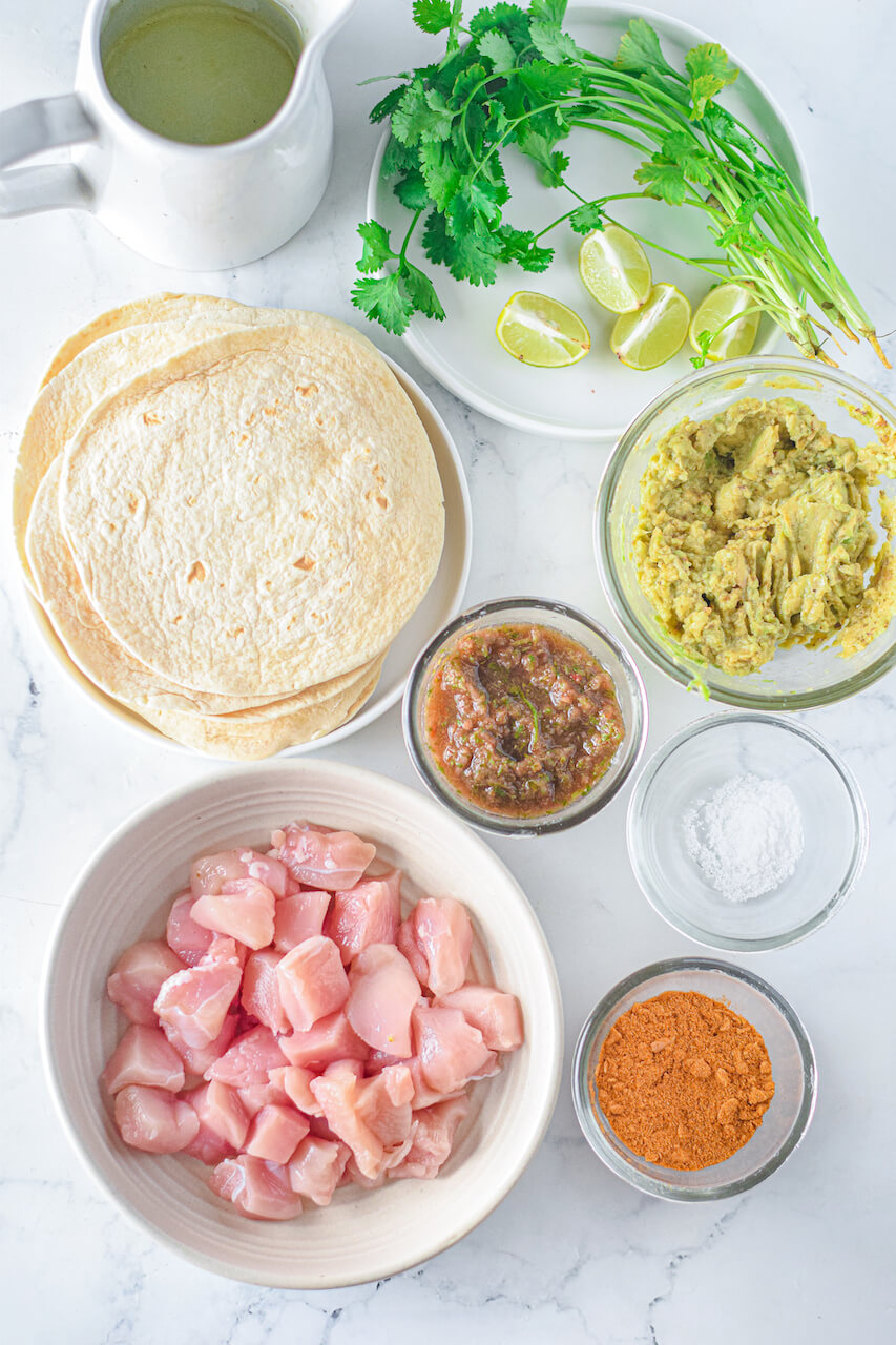 Chicken, tortillas, seasoning, limes for the dish.