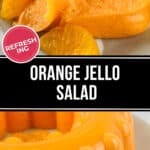 A whole mold of Orange Jello Salad with enticing slices is elegantly presented alongside vibrant orange segments on a pristine white plate.