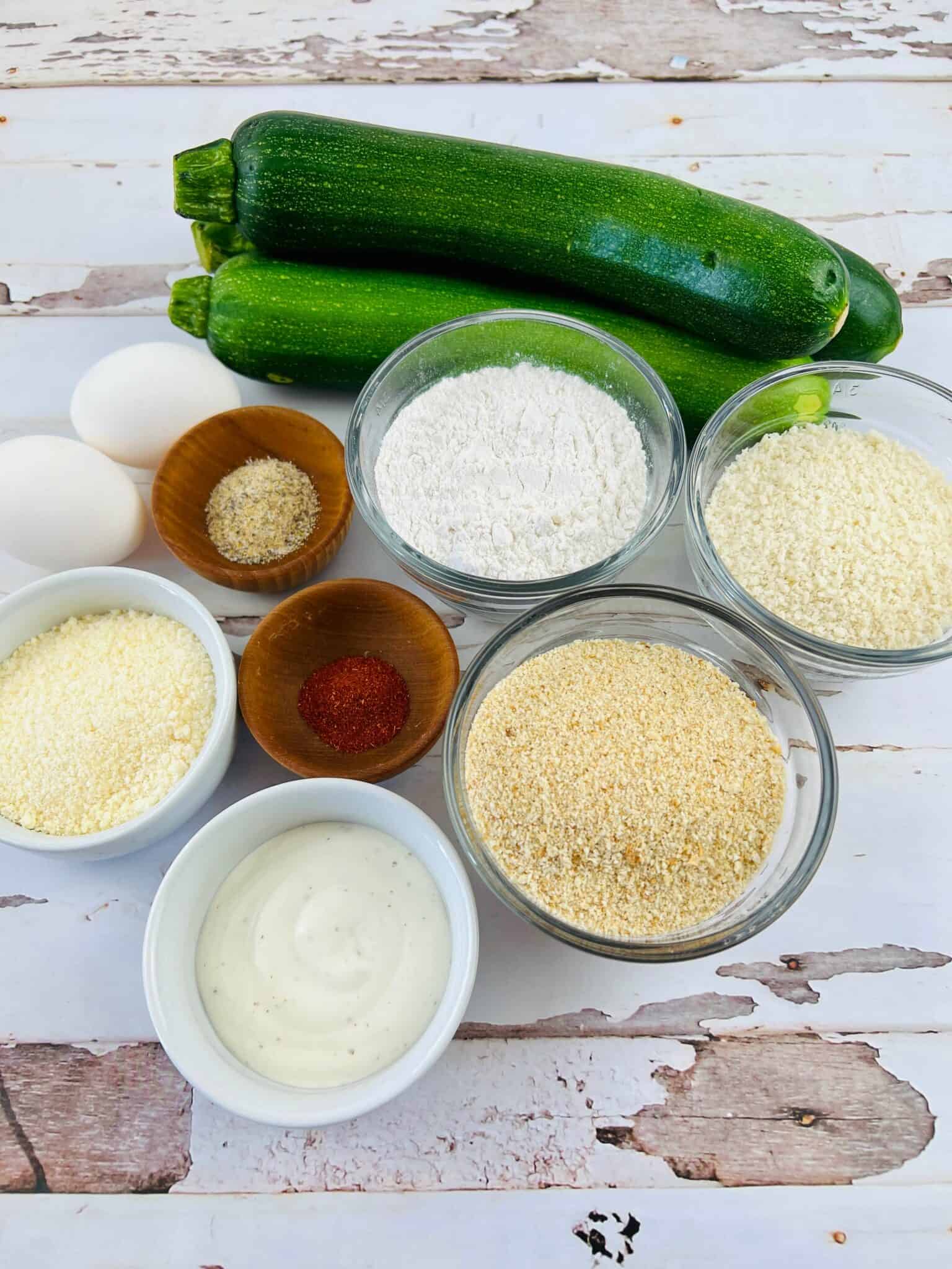 Zucchini with breading, eggs, flour and seasoning.