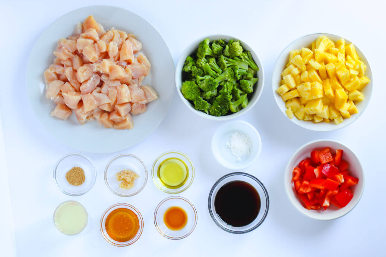 Chicken, vegetables and ingredients to make the sauce.