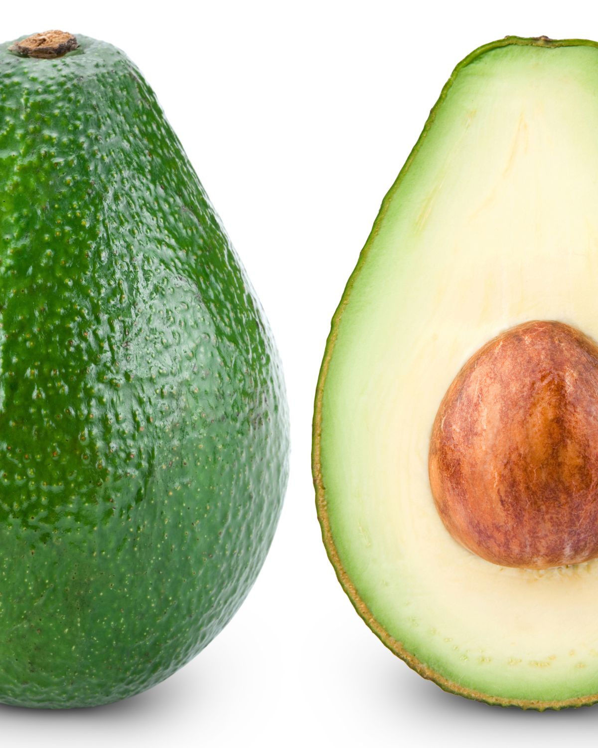 Two halfs of an avocado next to each other.