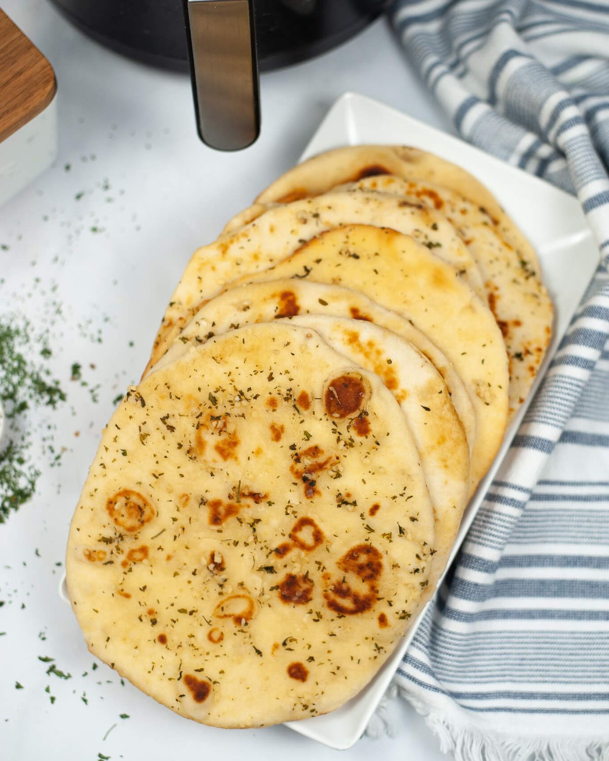 A tray of the air fryer naan bread.