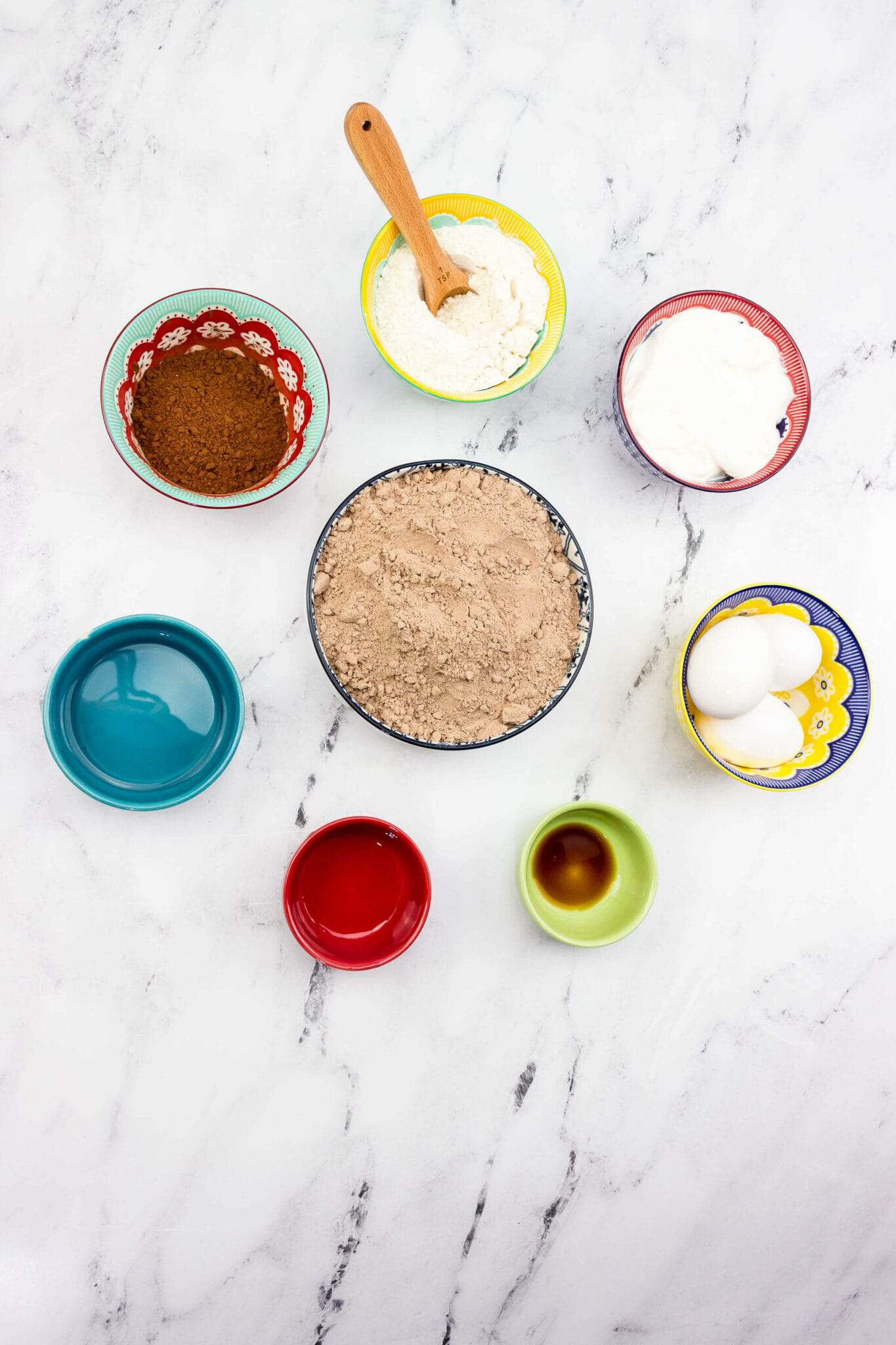 The cake mix, eggs, sour cream and ingredients to make this cake.