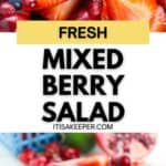 Close-up of a Strawberry Blueberry Salad featuring strawberries, blueberries, and cranberries, with the text “Fresh Mixed Berry Salad itisakeeper.com.”.