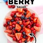A plate of mixed berry salad with strawberries, cherries, blueberries, and raspberries, surrounded by fresh berries; labeled "Strawberry Blueberry Salad" and "Fresh.