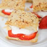 A plate of amaretto strawberry pastry stacks.