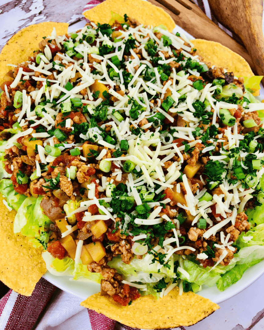 A shot of the Chicken Picadillo Taco salad from the top, highlighting all the ingredients.