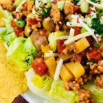 A close look at the finished chicken picadillo taco salad.