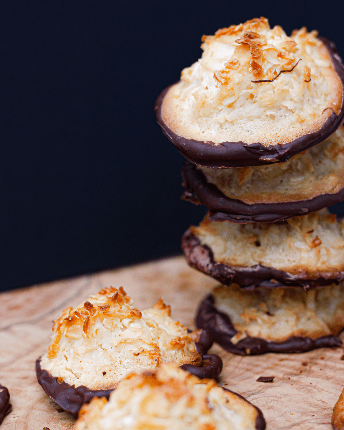 A tall stack of the finished cookies coated in the chocolate.