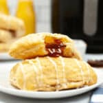 Two Homemade Toaster Strudels on a white plate.
