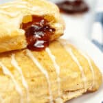 Jam oozing out of a homemade toaster strudel.