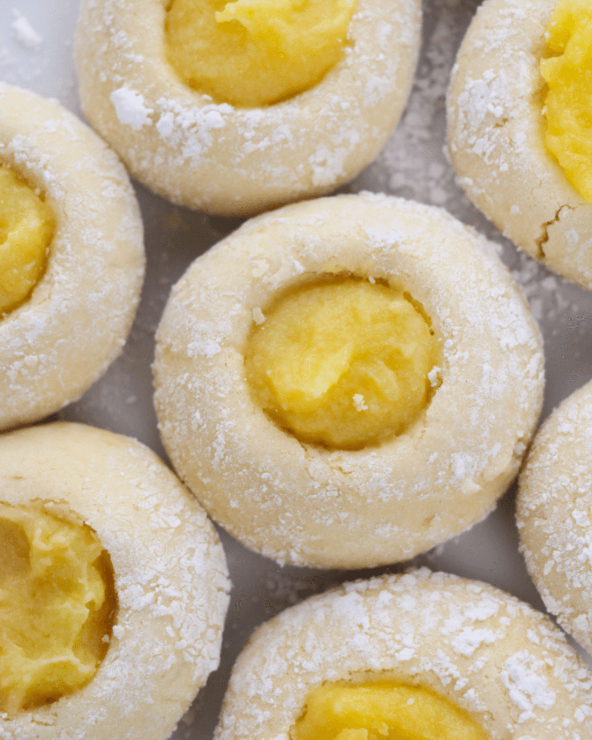 A closeup on the top of the finished lemon curd cookie.