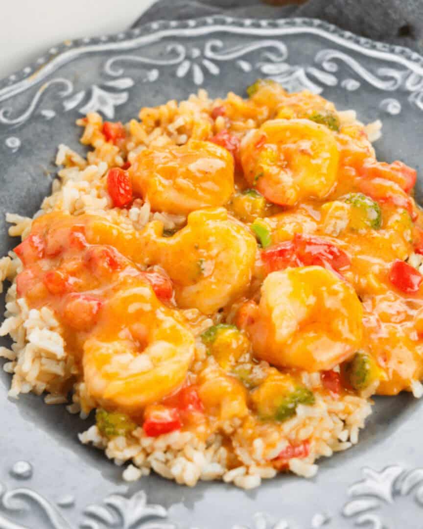 Red curry shrimp in a decorative bowl.