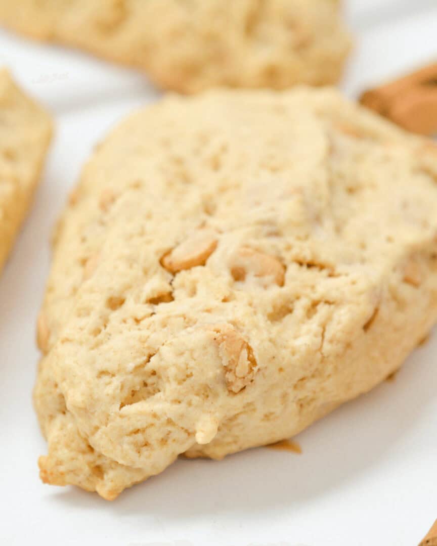 A close up on the finished golden cinnamon chip scone.