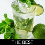 A tall glass of Cuban Mojito with lime slices, fresh mint leaves, and a black and white striped straw; accompanied by additional mint leaves and a whole lime. Text reads "The Best Cuban Mojito.