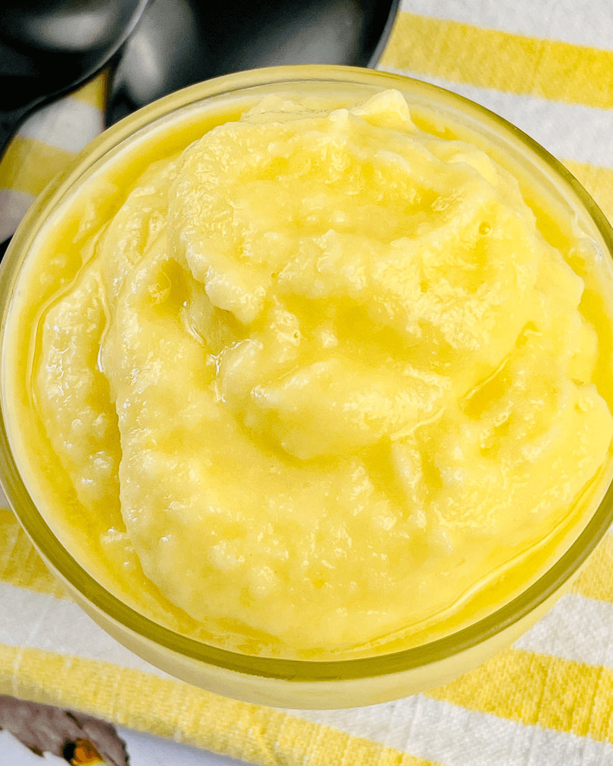 A clear glass dish of Dole Pineapple whip.