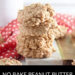 A stack of No Bake Peanut Butter Oatmeal Cookies is shown on a white surface, with more cookies and a red polka dot cloth in the background.