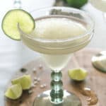 A skinny margarita with a slice of lime.