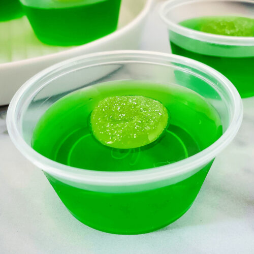 A sour apple green jello shot.