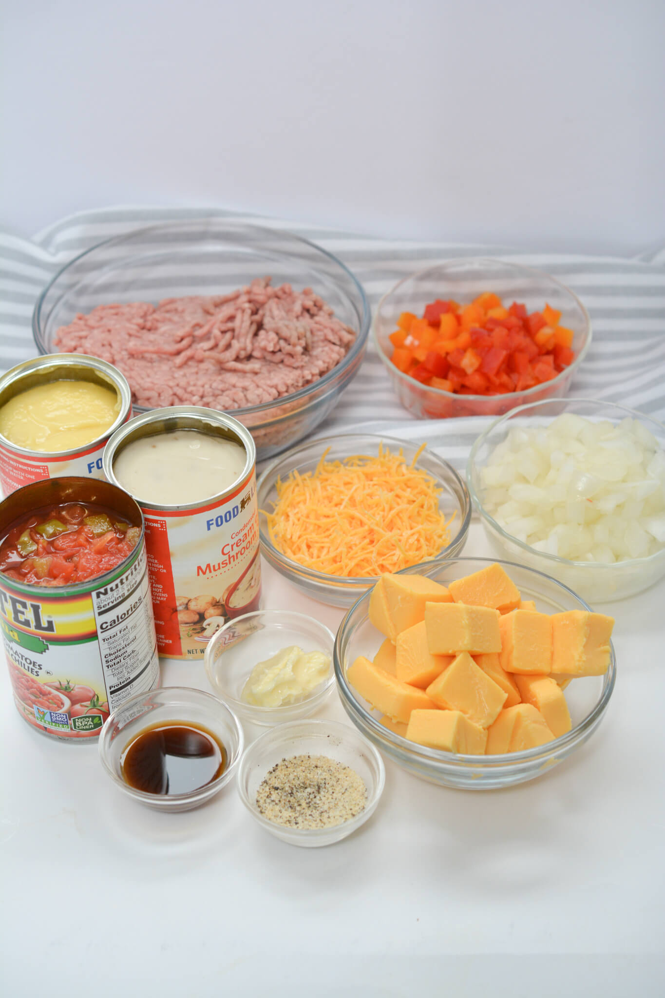 Beef, cheese, rotels and vegetables to make the Tex Mexican Casserole with Ground Beef.



