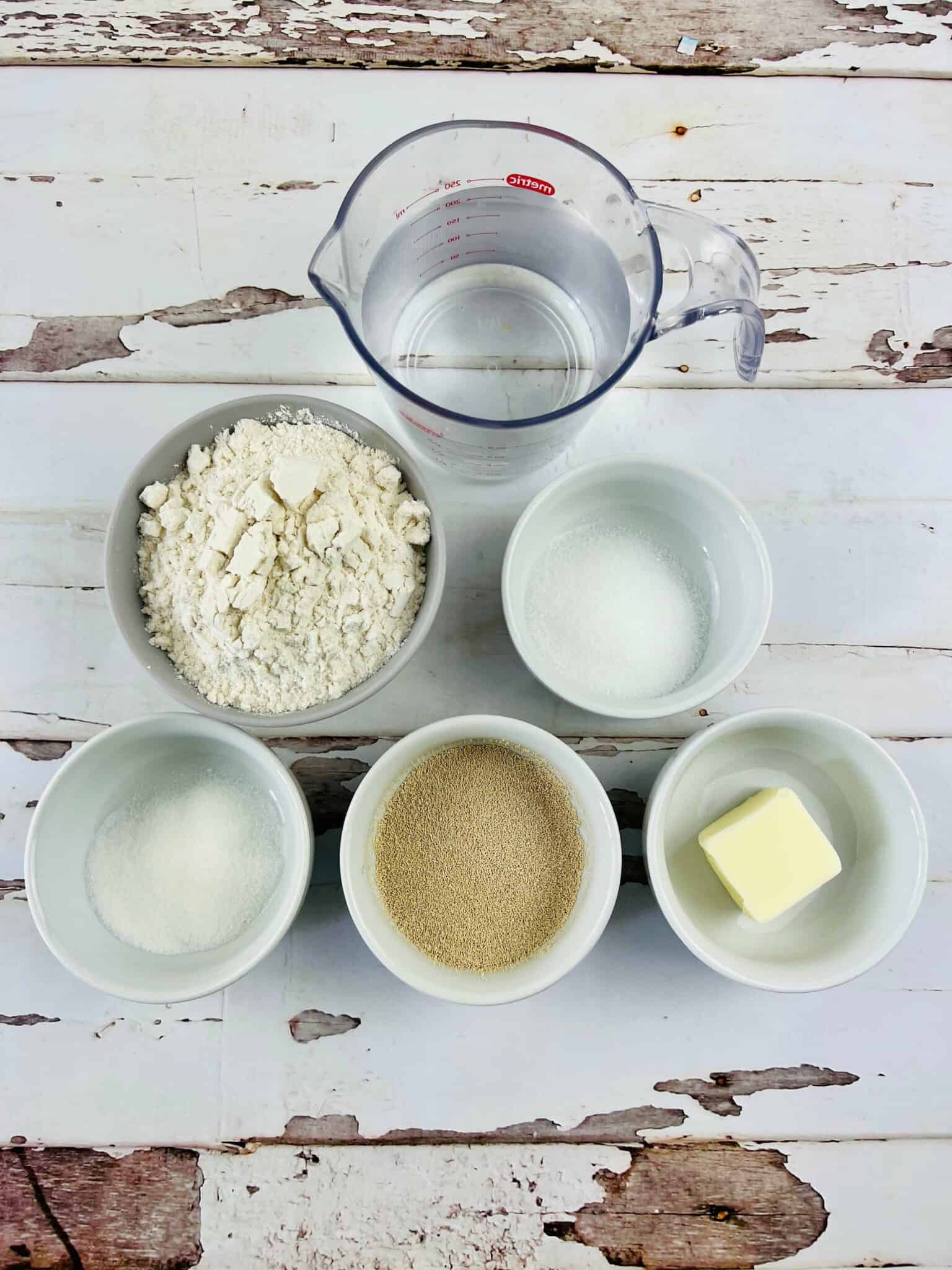 Flour, water, butter, eggs and sugar for the loaf.