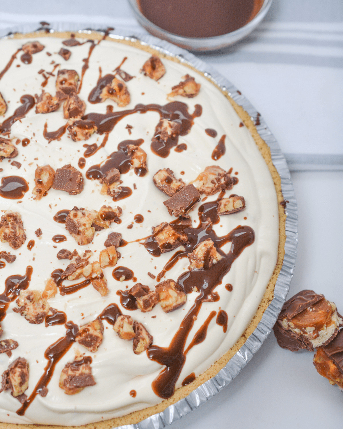 A view of the top of the no bake snickers pie.