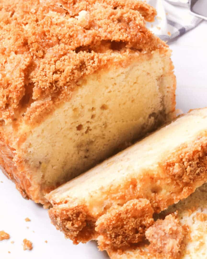 Old Fashioned Banana Bread with Streusel Topping sliced and ready to serve.