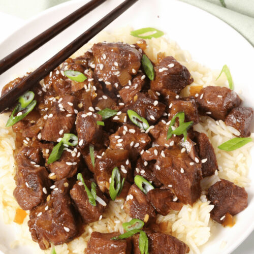 A white plate of slow cooker beef bulgogi bowl.