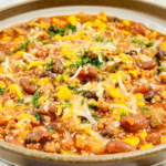 A stoneware bowl of the slow cooker taco chili.