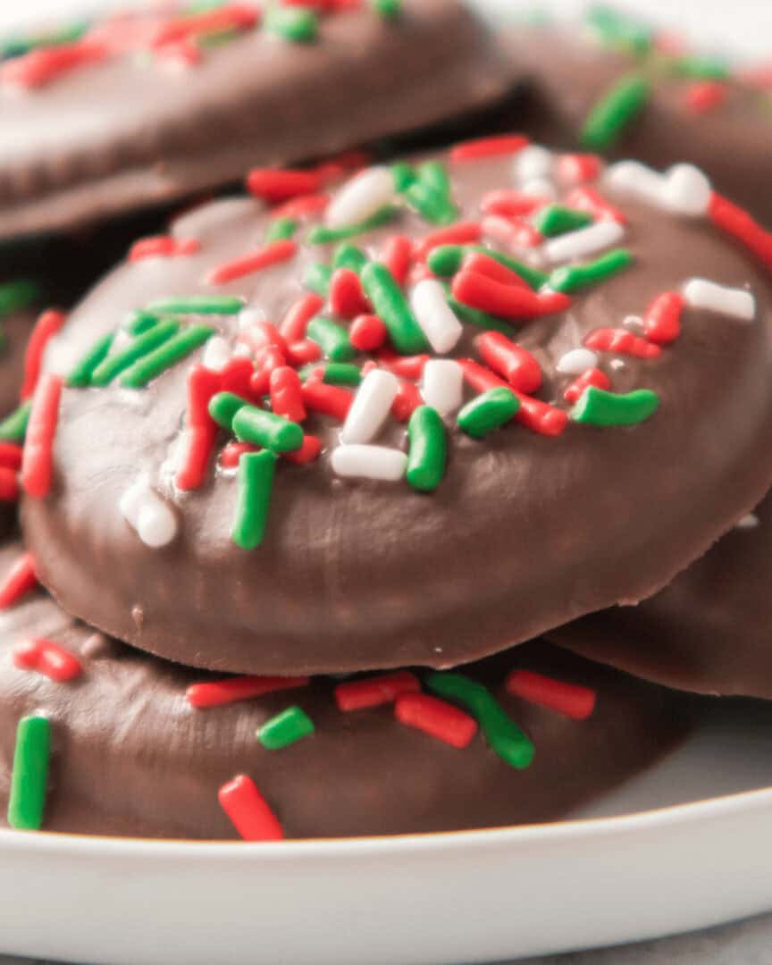 Tempting Thin Mint Girl Scout Cookies with sprinkles.