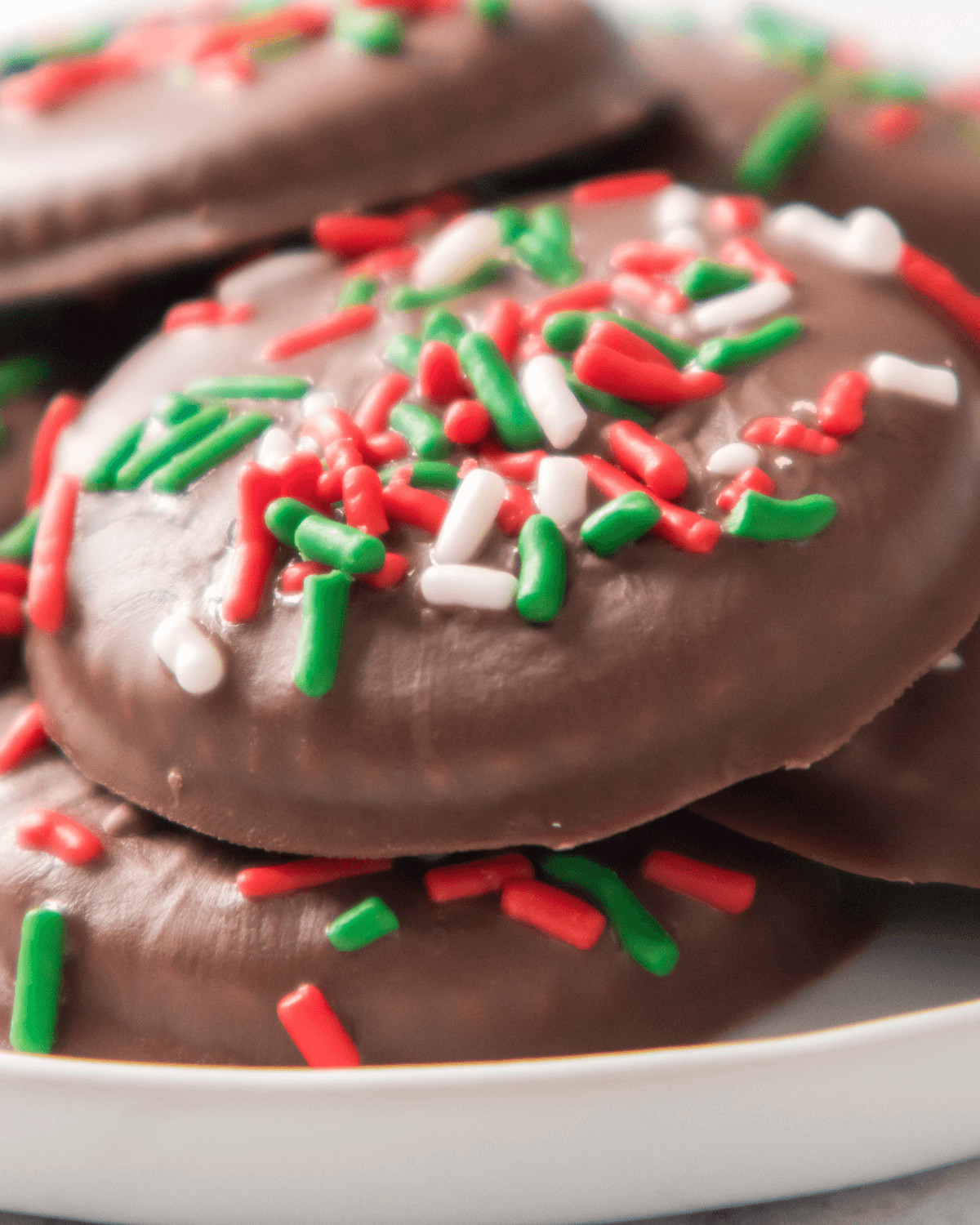 Tempting Thin Mint Girl Scout Cookies with sprinkles.


