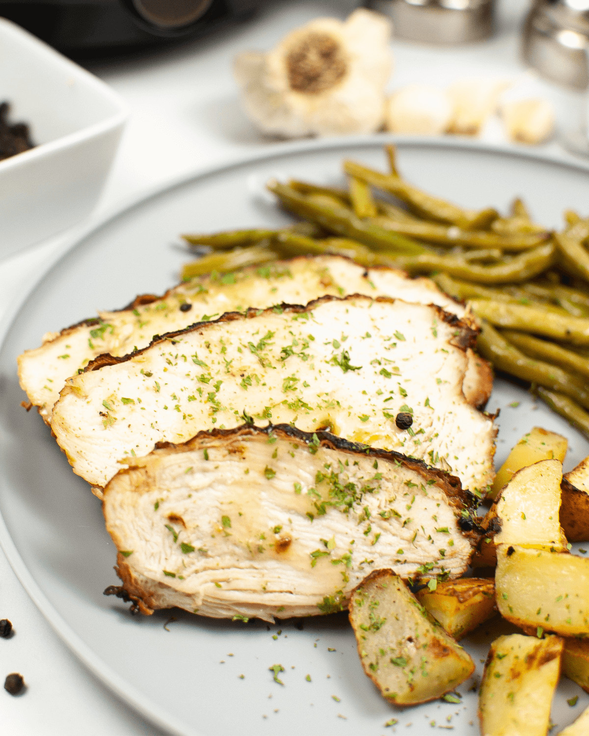 A close look at a plate of air fryer turkey breast.