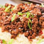 A serving of the ground beef bulgogi with chopsticks.