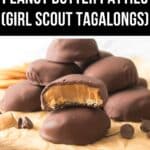 A stack of decadent Peanut Butter Patties, chocolate-covered and tempting, with one showing a bite taken out, sits on parchment paper surrounded by scattered chocolate chips and crackers.