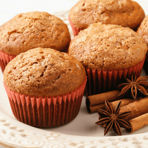 A group of spice cake pumpkin muffins.