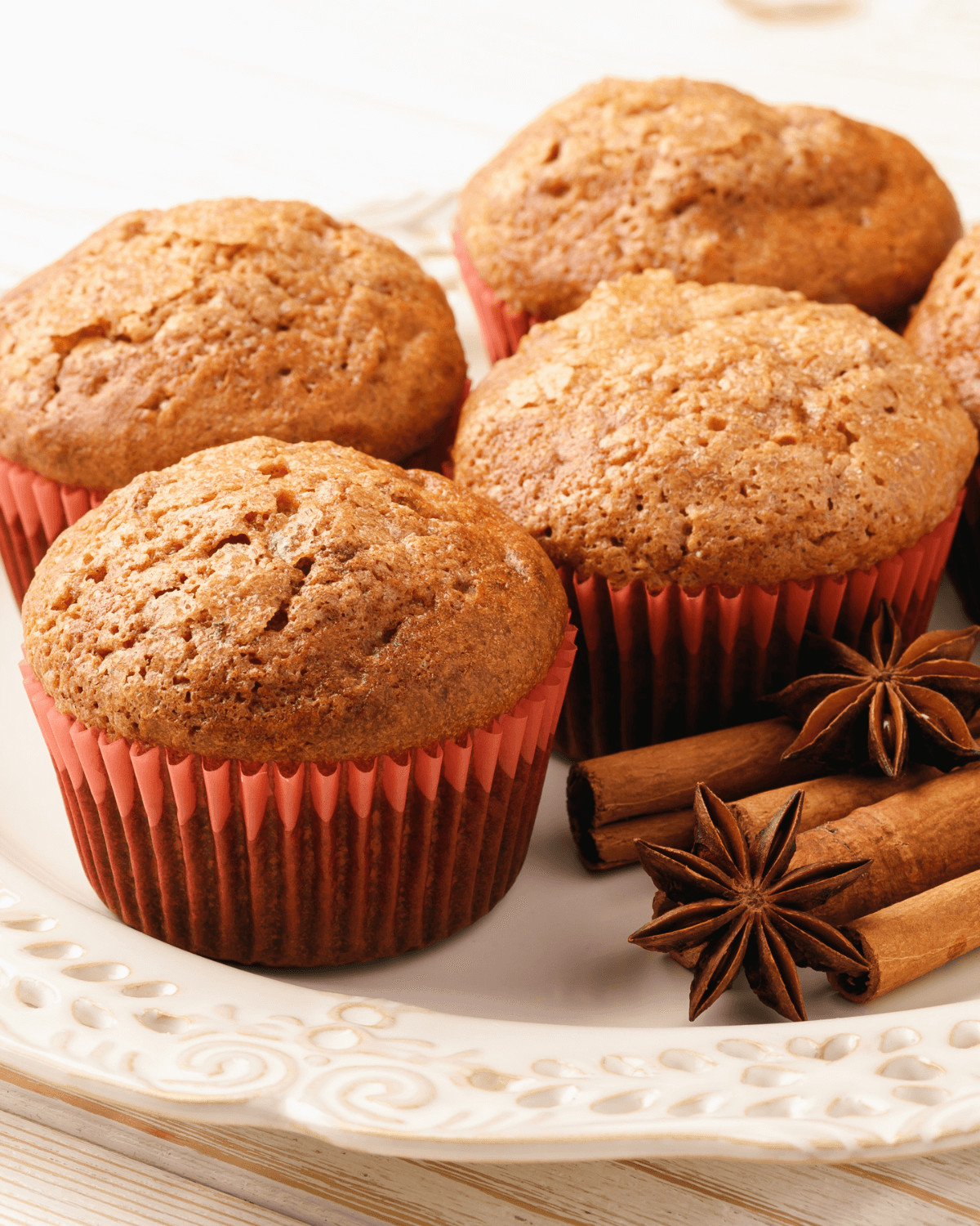 A group of spice cake pumpkin muffins.