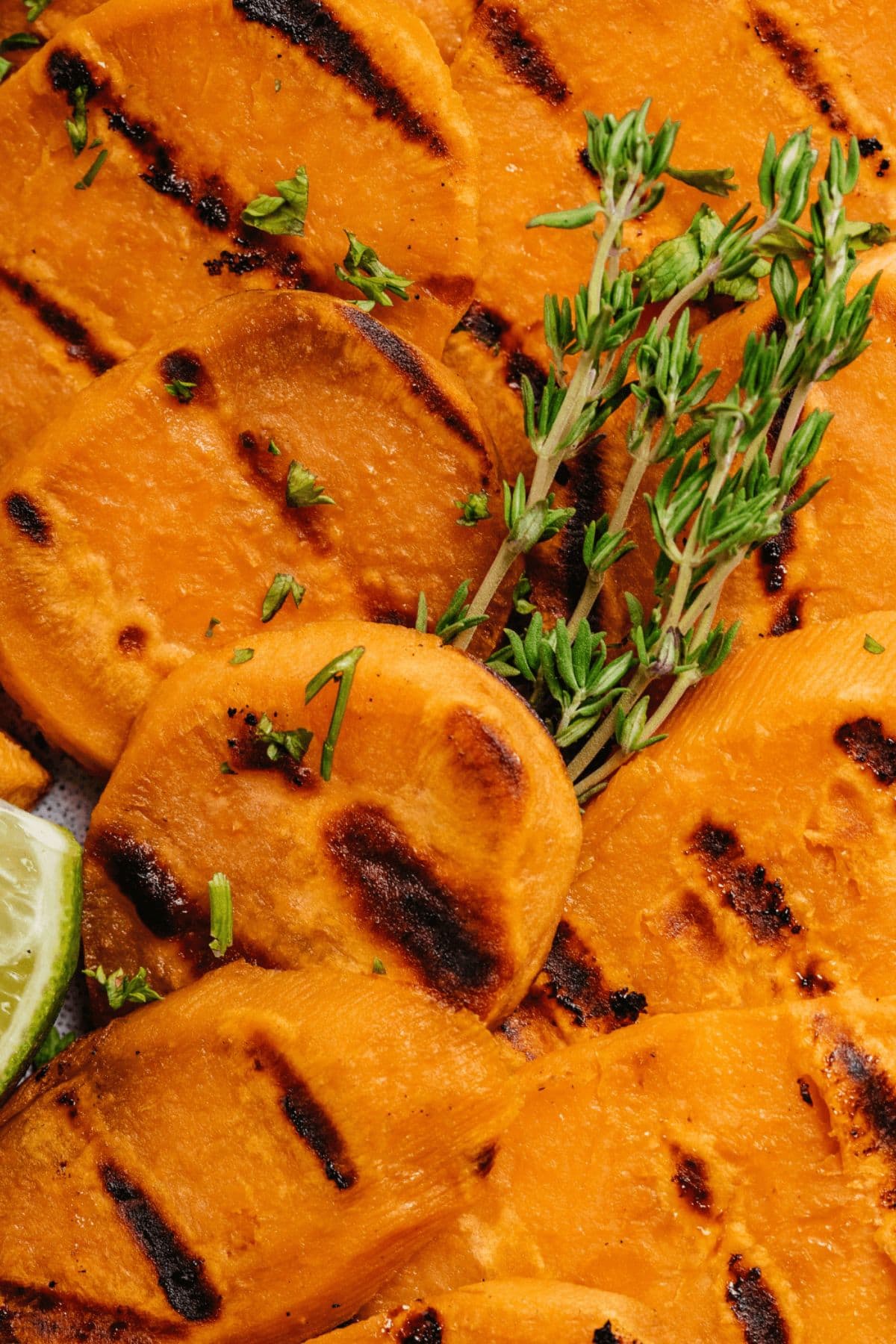 A top shot of the cooked rounds with thyme on top.