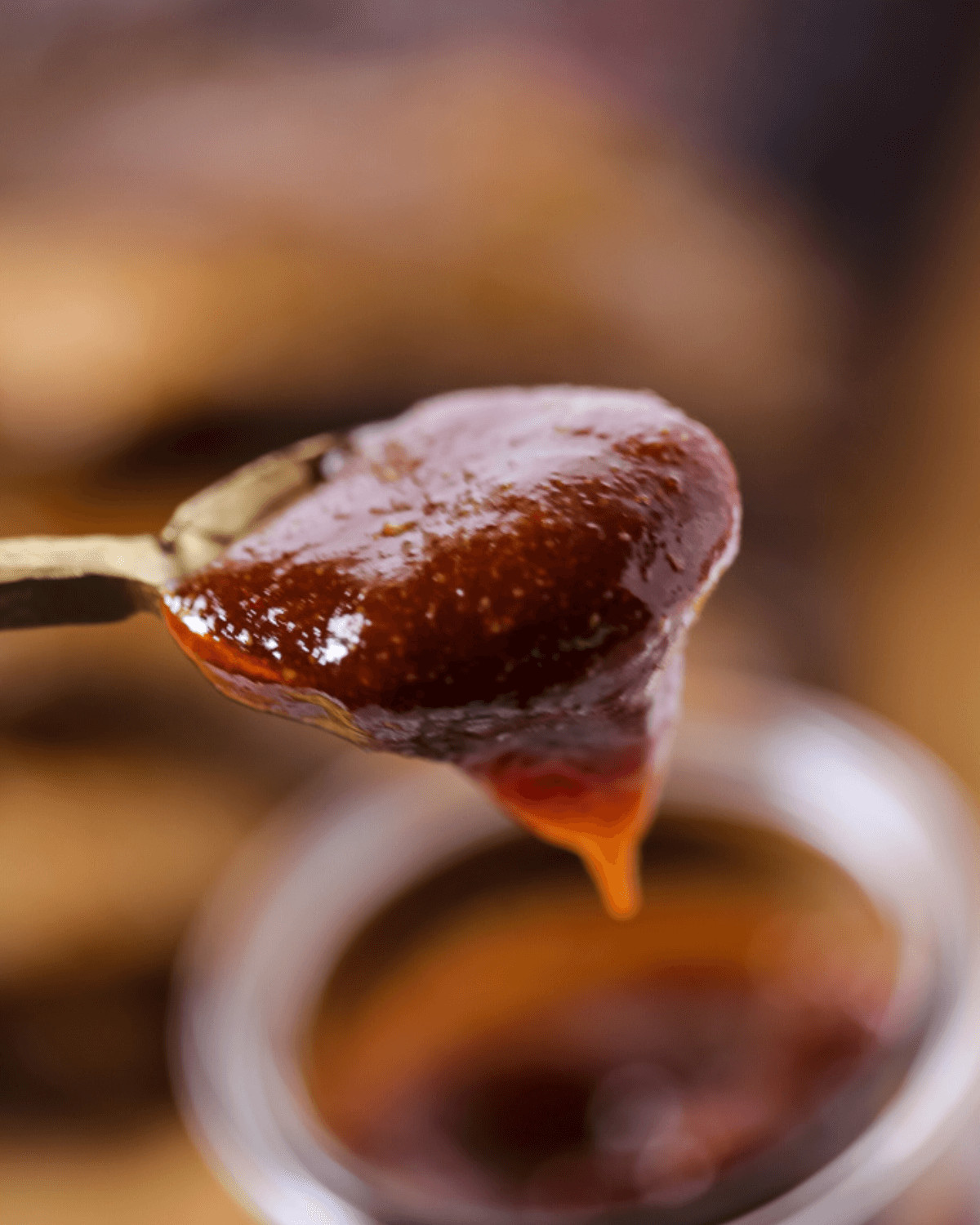 A spoon of the sweet and spicy bbq sauce.