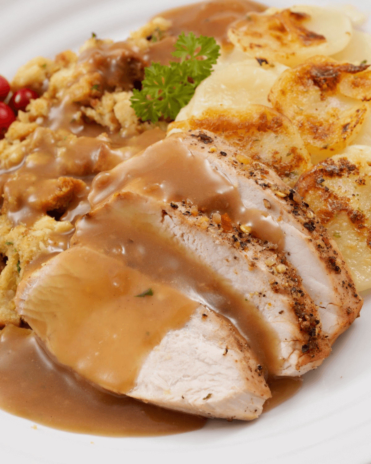 Turkey covered with turkey gravy from drippings.