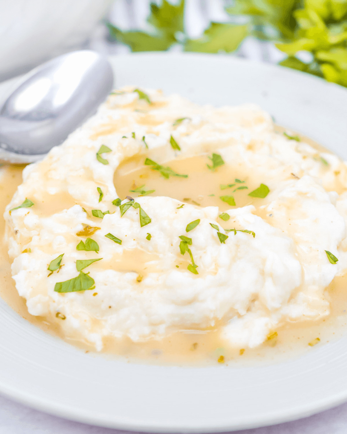 Mashed potatoes with turkey gravy without drippings on them.