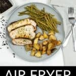 A plate with sliced air fryer turkey breast, roasted potatoes, and green beans sits beside utensils, garlic, pepper, and an air fryer. Text reads: "AIR FRYER TURKEY BREAST.