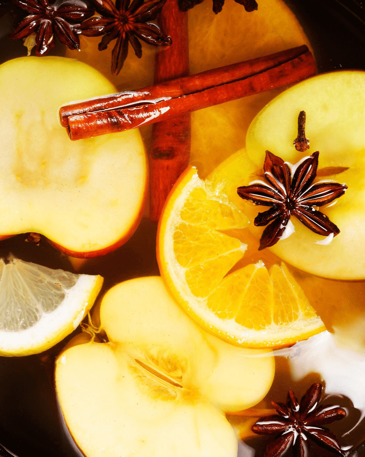 A close up on the sliced fruit in the beverage.