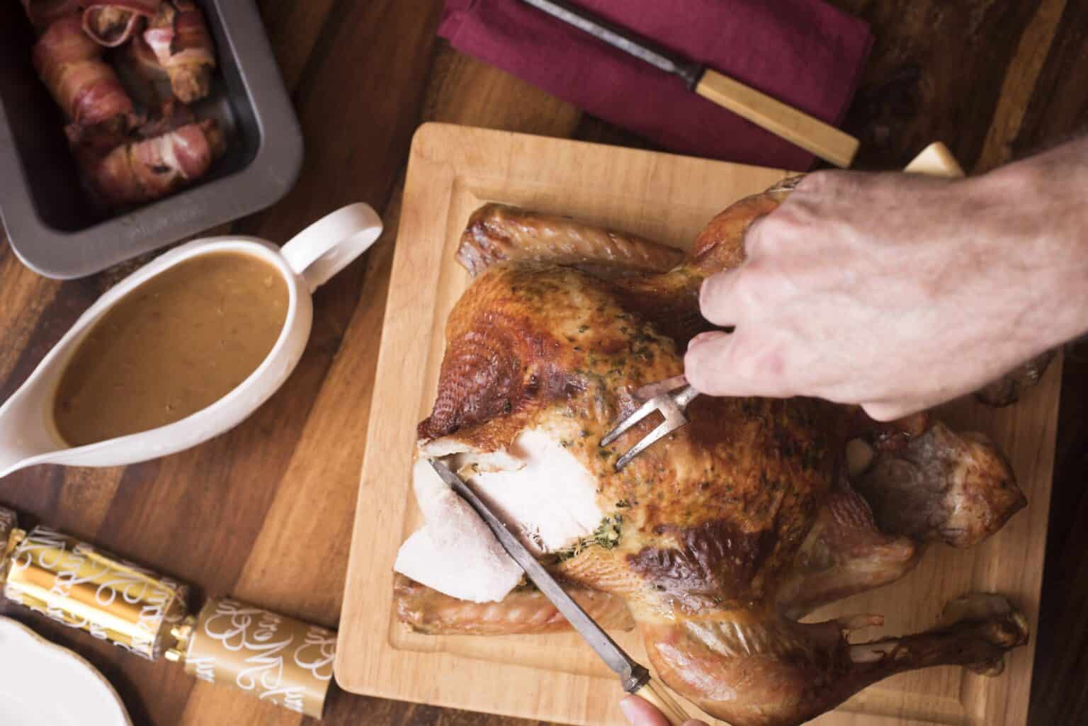 Slicing a turkey breast.