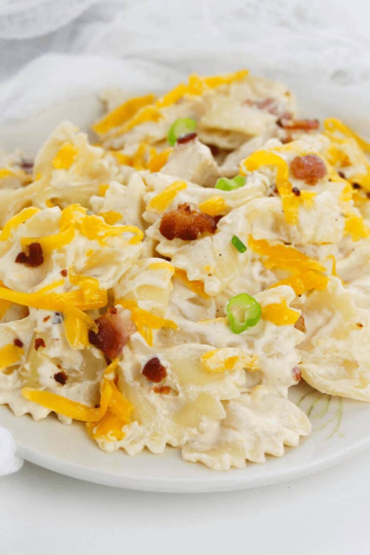 A white plate filled with the crack chicken pasta.