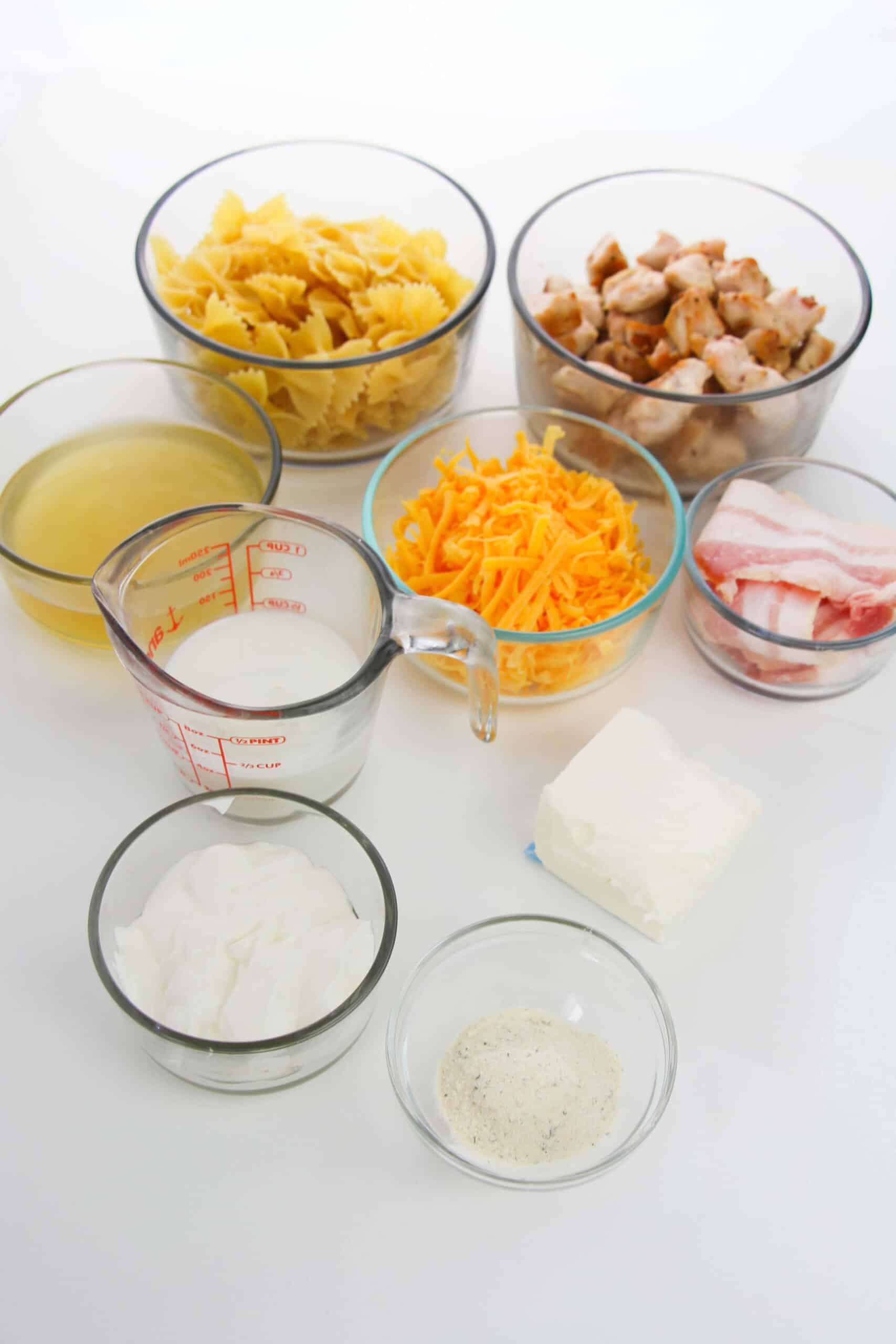 Cubed chicken, pasta and other ingredients.