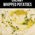 A close-up of creamy whipped potatoes topped with melted butter and sprinkled with chopped chives, showing the smooth texture of these delicious whipped potatoes.