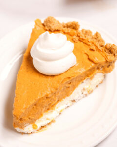 A slice of the double layer cream cheese pumpkin pie.
