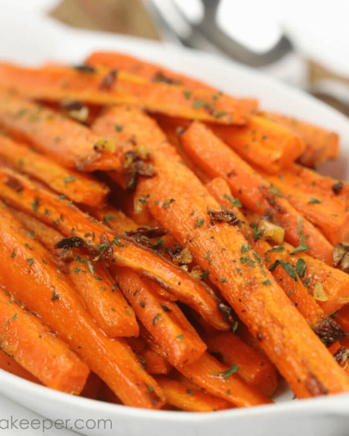 A platter of oven roasted honey garlic baby carrots.