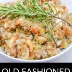 A bowl of Old Fashioned Stuffing garnished with fresh rosemary and thyme, featuring a black label at the bottom that reads "Old Fashioned Stuffing.