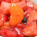 A close up on the cherry jello fruit salad.